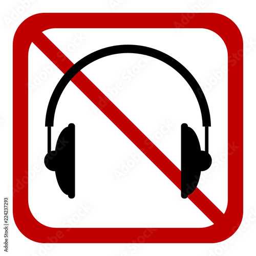 Prohibition sign headphones on white.