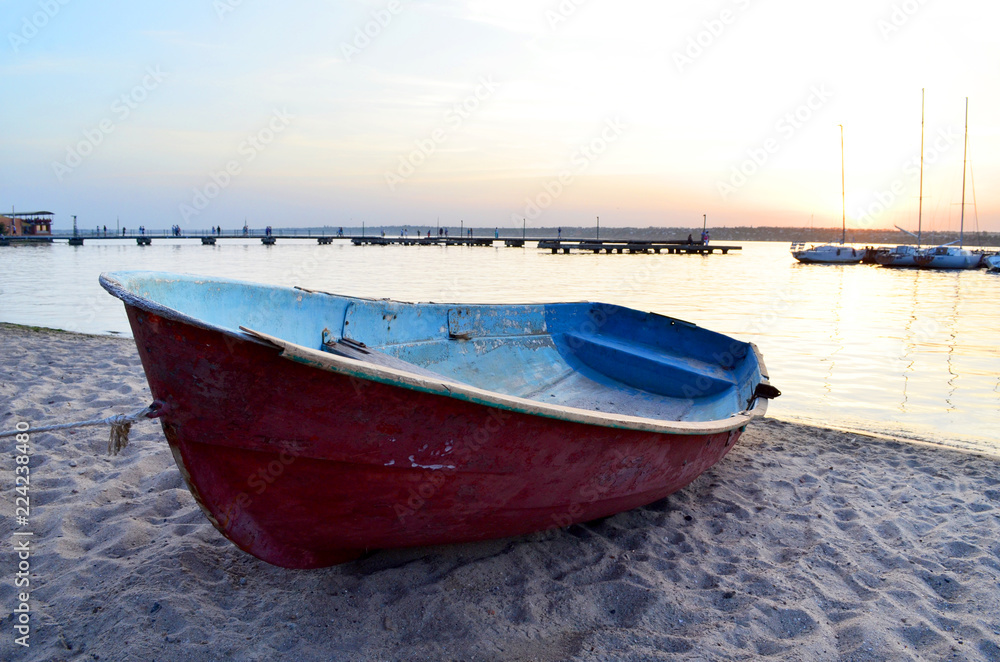 Lonely old boat on the shore