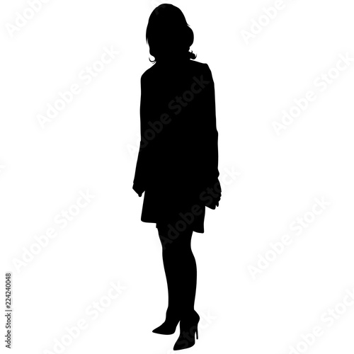 silhoutte of standing woman in short dress