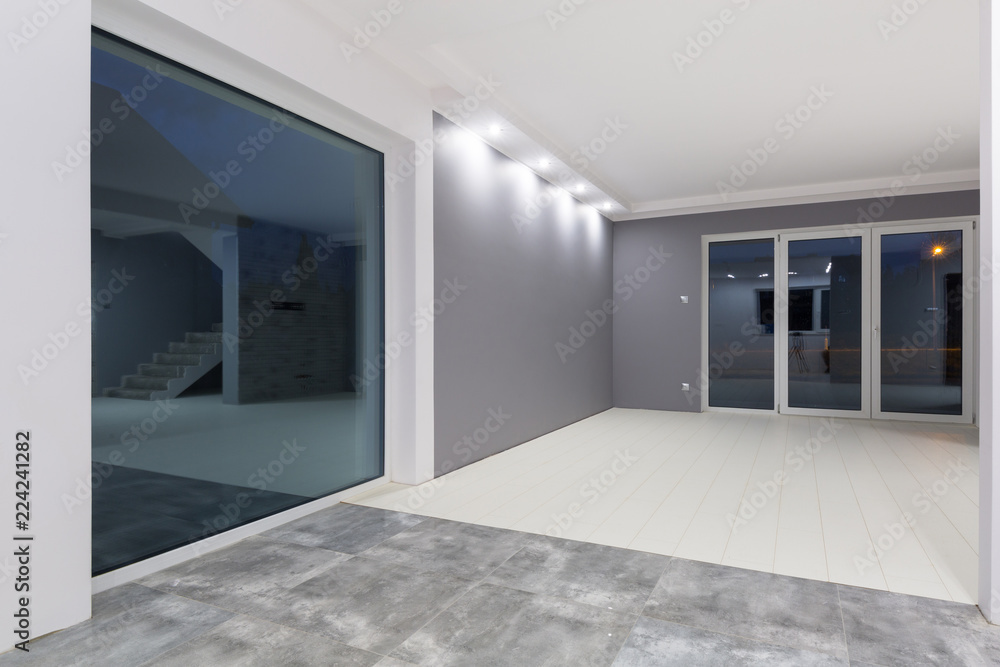Living room with new laminated floor and decorative wall Living room with new laminated floor and decorative wall