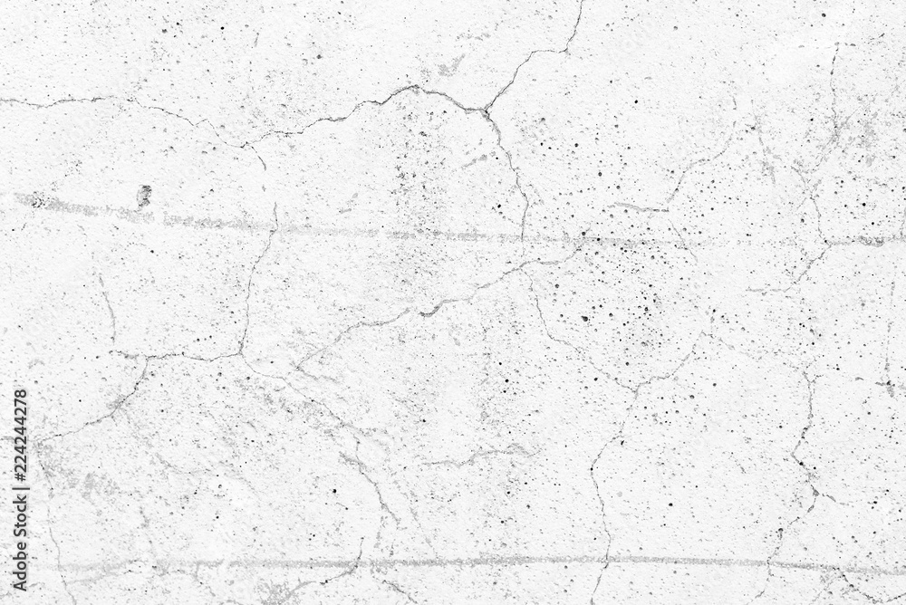Fototapeta premium Wall fragment with scratches and cracks. It can be used as a background