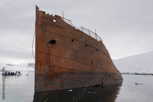 Old rusty wreck in Antarctica photo