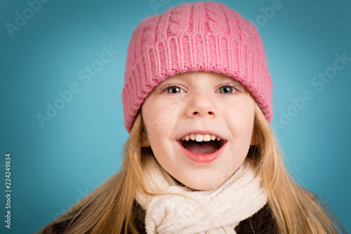 Singing Little Christmas Girl in Winter Clothing