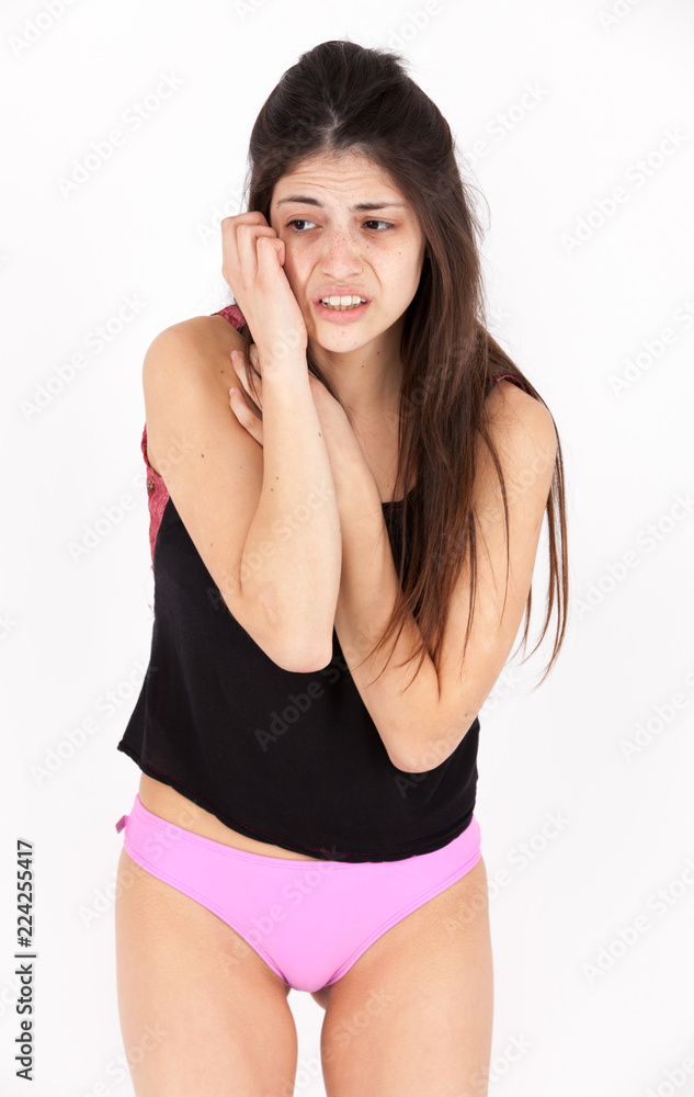 Fear emotional girl on a light background Fear emotional girl on a light background