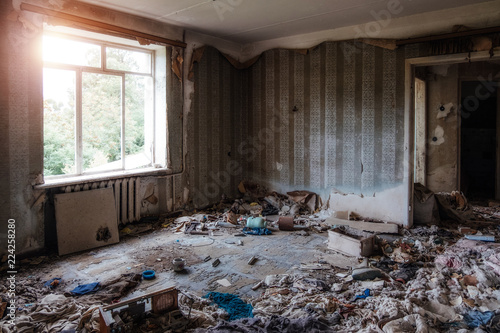 Interior of domestic room of abandoned forsaken apartment house