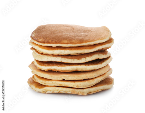 Stack of hot tasty pancakes on white background