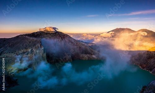 Crater with acidic crater lake Kawah Ijen the famous tourist attraction, where sulfur is mined. Aerial view of Ijen volcano complex is a group of stratovolcanoes in the Banyuwangi Regency of East Java