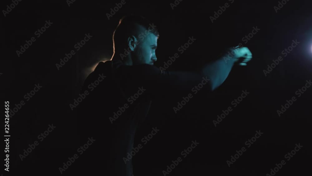 Mixfighter MMA. a fight with a shadow low key fighter. Mixfighter MMA. a fight with a shadow low key fighter.
