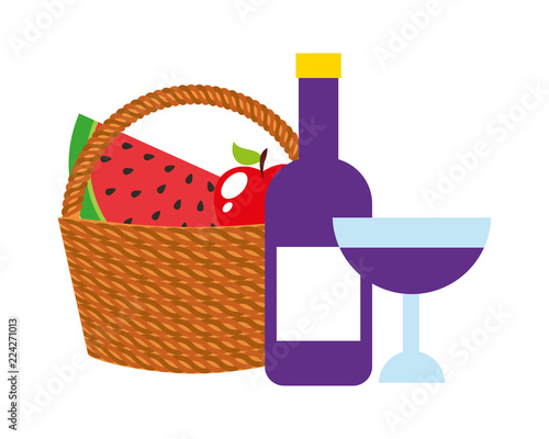 basket picnic with fruits and bottle wine