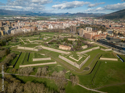 Billede på lærred Aerial view of Pamplona citadel with blue clodu sky background on a spring morni