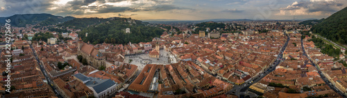 Fotografie Brasov cityscape aerial view with balck church, white tower, red roofs in Romani
