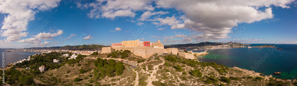 Aerial panorama of Ibiza fortress with blue sky