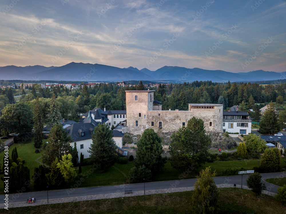 Aerial sunset view of Liptovsky Hradok renaissance luxury castle hotel in Slovakia