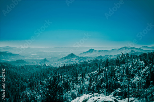 Mountains with forest in fog , Black hills national forest , SD , USA photo
