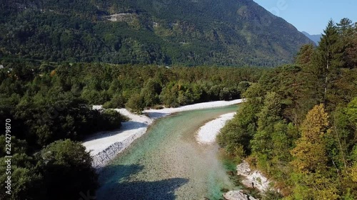 River and fir trees. Landscape in Slovenia. HD. photo