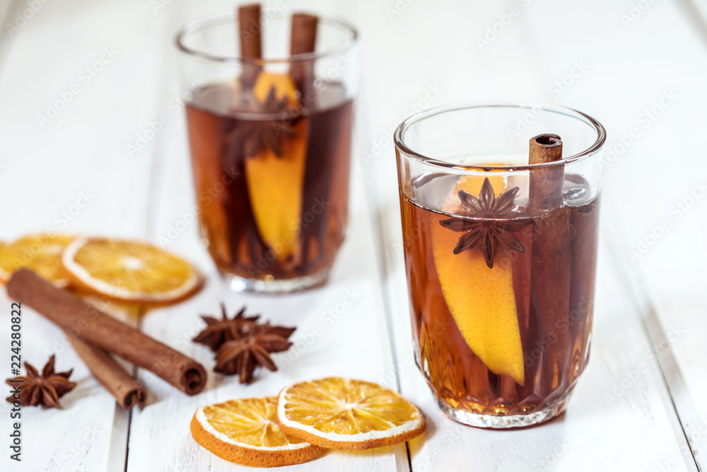 Mulled wine in night celebration of New Year party and delicious Christmas drink for autumn and winter season Mulled wine in night celebration of New Year party and delicious Christmas drink for autumn and winter season