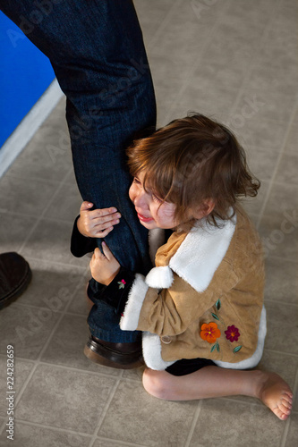 Crying and Holding Onto the Leg of Daddy When He Has to Leave