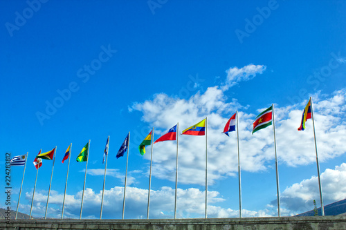 Flags of South America, Andean Community, on the background the sky. Thirteen flags.