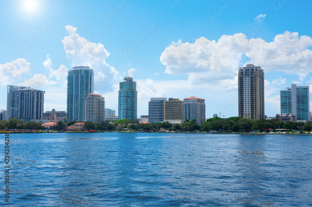 Saint Petersburg, Florida, buildings cityscape along the blue water shoreline of Tampa Bay on a beautiful sunny afternoon.