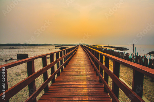 red bridge travel in morning at sea and beach sunlight beauty in nature