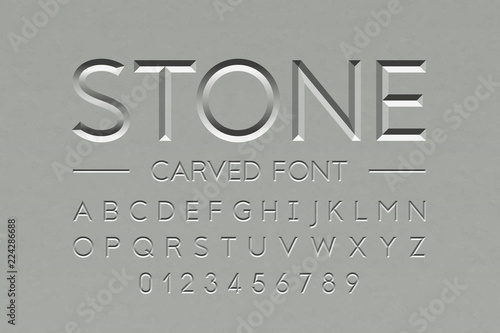 Stone carved font, alphabet letters and numbers
