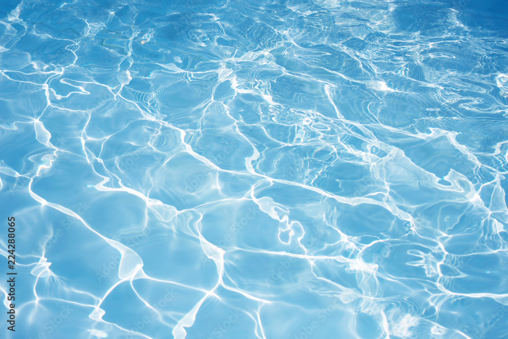 Fototapeta premium Texture of water in swimming pool for background
