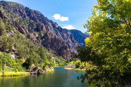 The Gunnison River flows through Black Canyon of the Gunnison National Park in Colorado photo