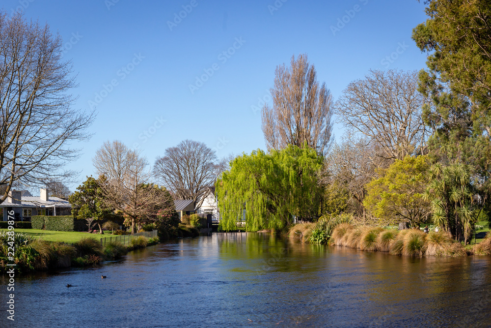 The Avon River flows through historic Mona Vale gardens in Christchurch, New Zealand The Avon River flows through historic Mona Vale gardens in Christchurch, New Zealand