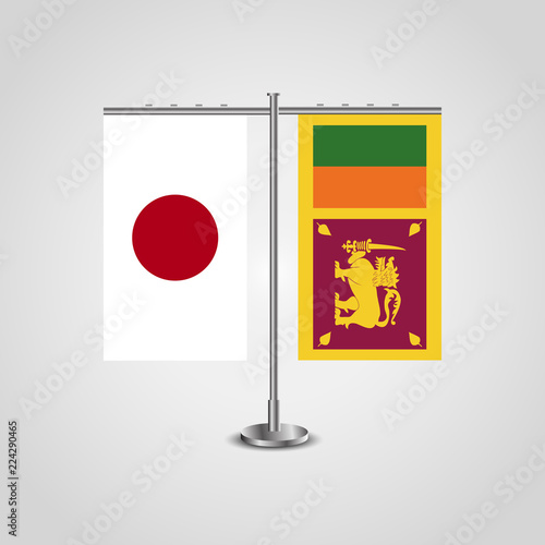 Table stand with flags of Japan and Sri Lanka.Two flag. Flag pole. Symbolizing the cooperation between the two countries. Table flags