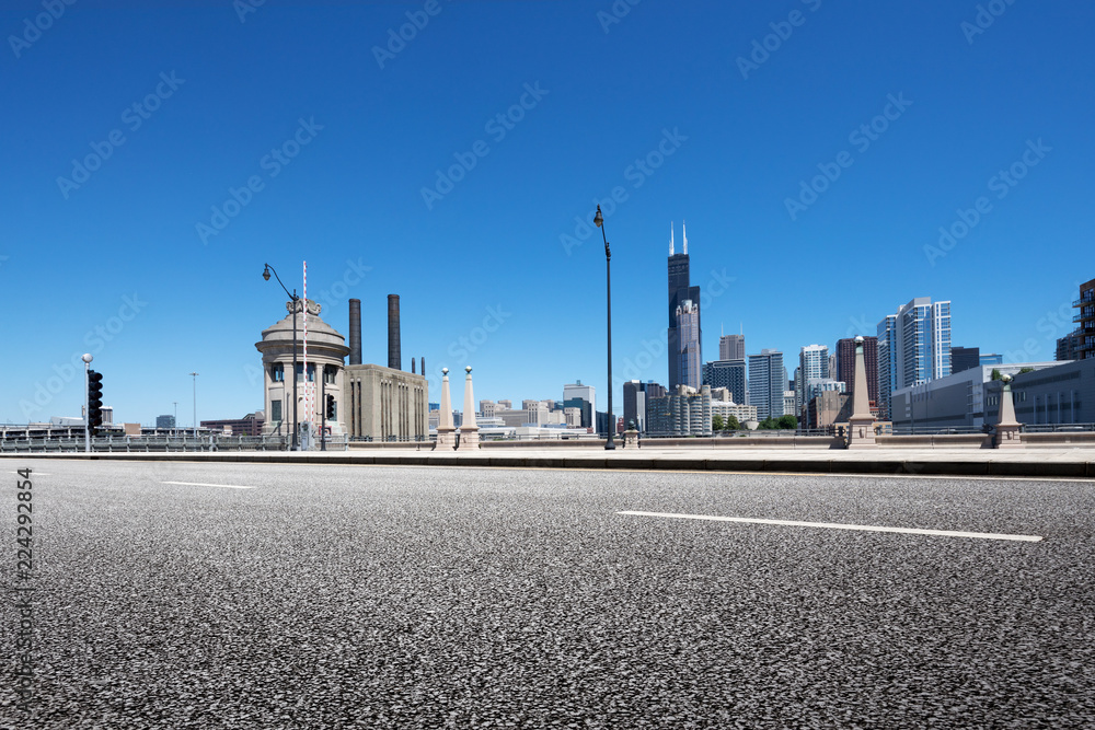 empty highway through modern city empty highway through modern city