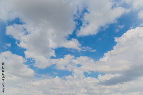 Fototapeta Naklejka Na Ścianę i Meble -  White sparse clouds over blue sky