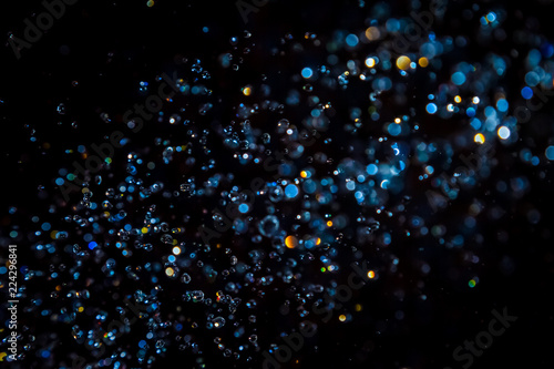 Wallpaper Mural Luxurious Blue bokeh texture on black Torontodigital.ca