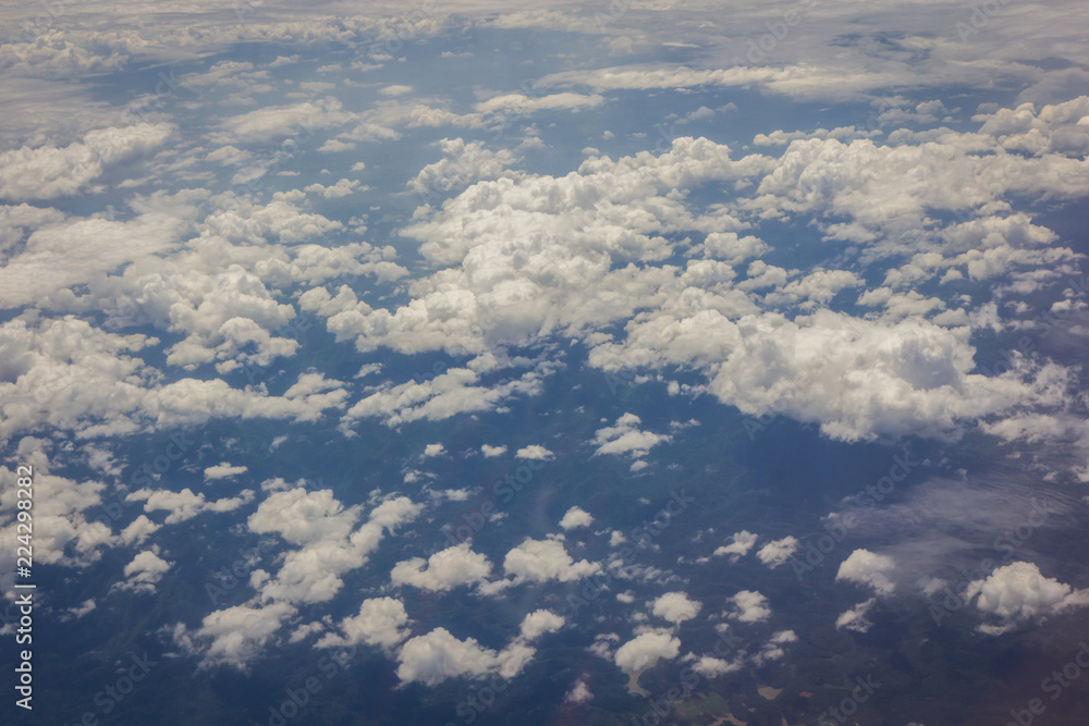 Blue sky with clouds background on the airplan Blue sky with clouds background on the airplan