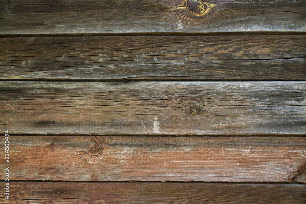 Texture of a wooden wall. Can be used as a background Texture of a wooden wall. Can be used as a background