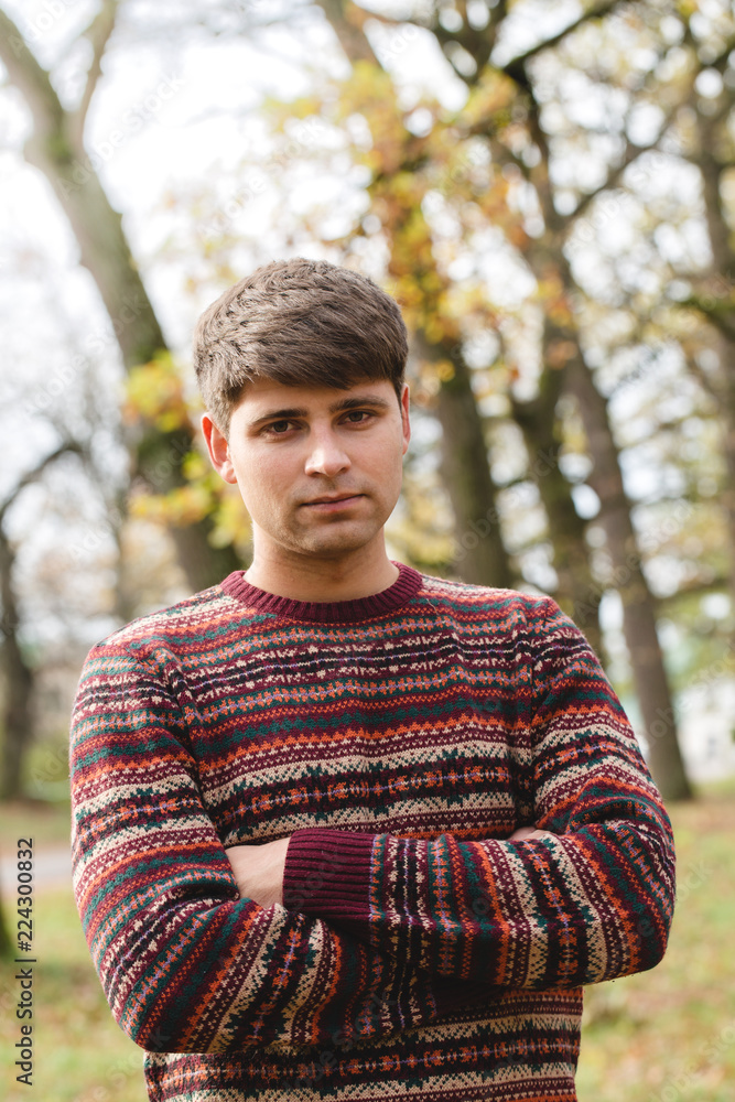 Portrait of a young man in the park Portrait of a young man in the park