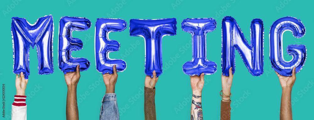 Hands showing meeting balloons word