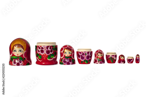 Souvenir of the Russian doll Nesting dolls bright red on white background isolated closeup