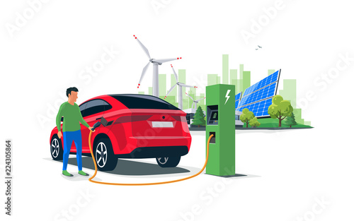 Electric suv car charging at the charger station with a young man holding the cable. Wind turbines and solar panels with green city skyline in background. Isolated flat vector illustration concept. 