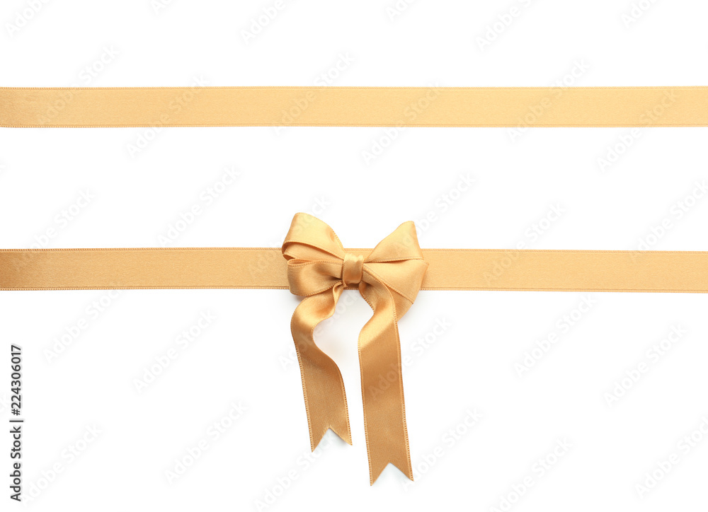 Golden ribbons with bow on white background Golden ribbons with bow on white background