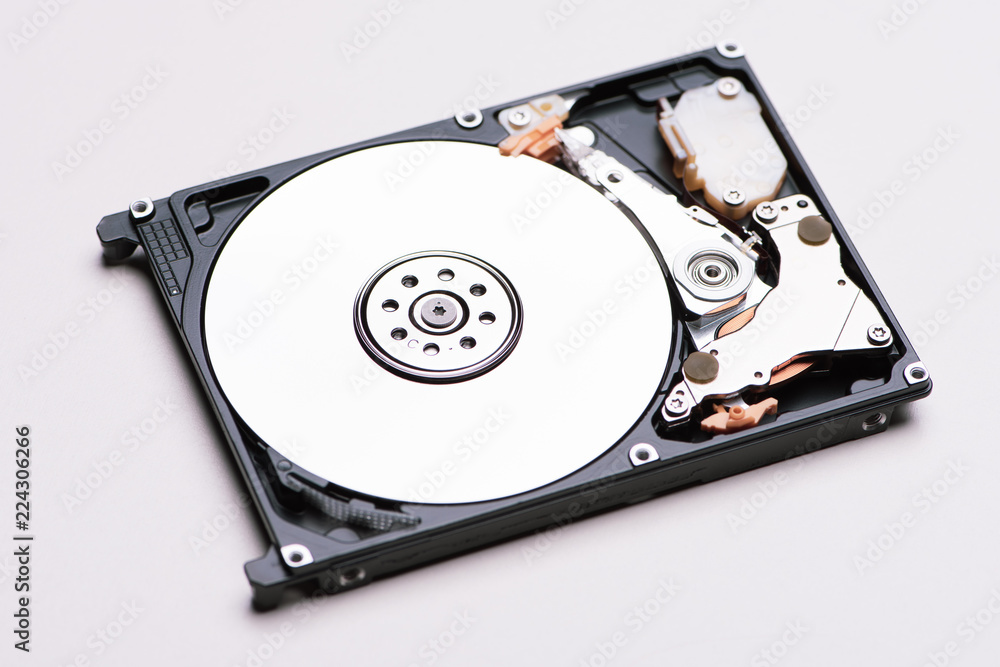 A hard disk drive isolated on white background. A hard disk drive isolated on white background.