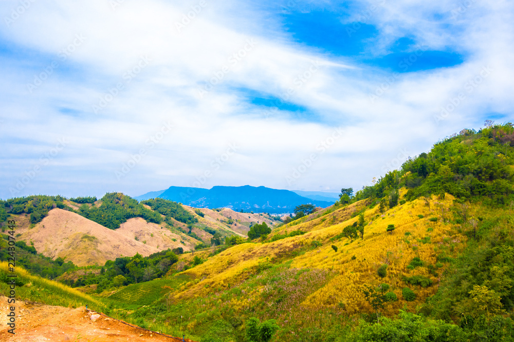 Beautiful  landscape view of hill and  mountain with cloud sky.