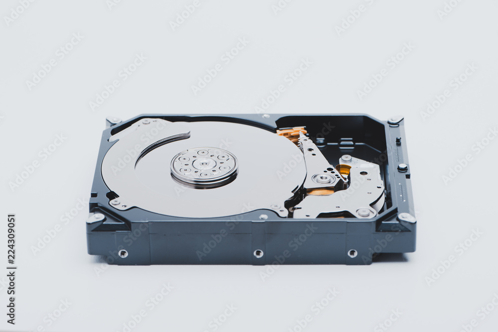 A hard disk drive isolated on white background. A hard disk drive isolated on white background.