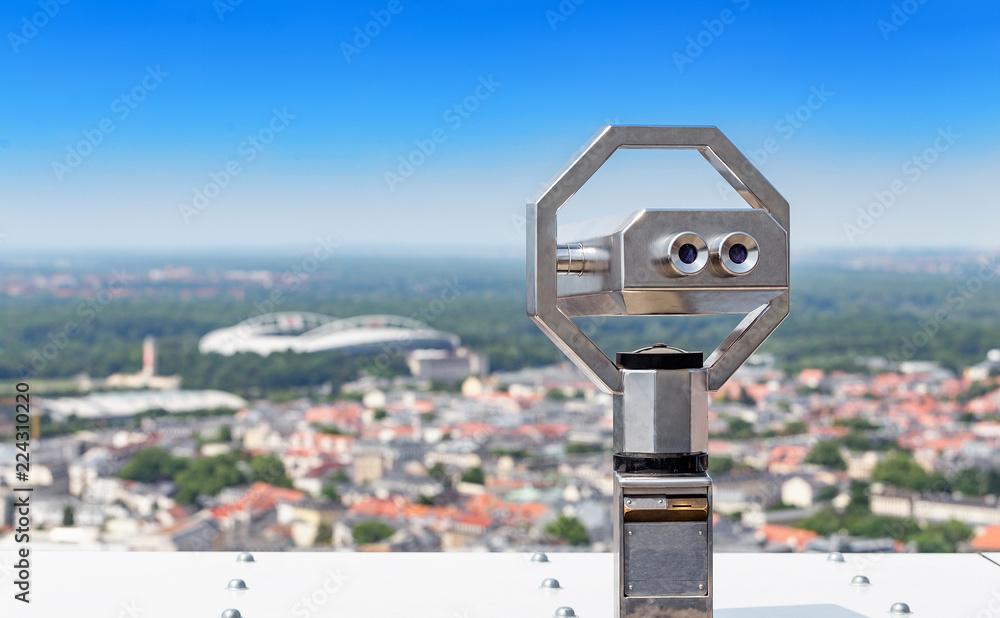 Touristic telescope look at the city with view of Leipzig, Germany