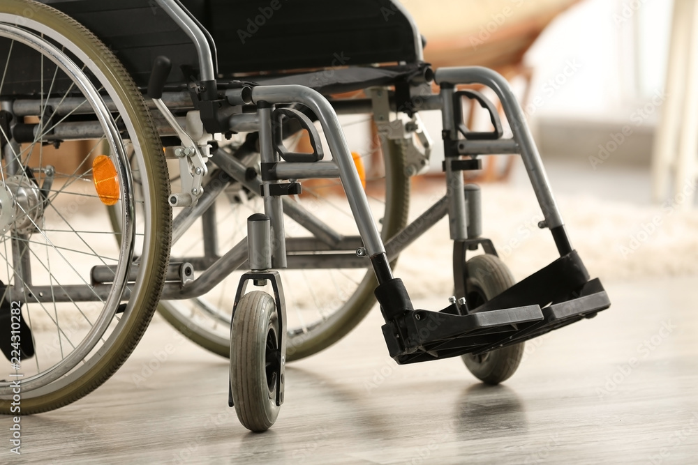 Fototapeta premium Empty modern wheelchair indoors