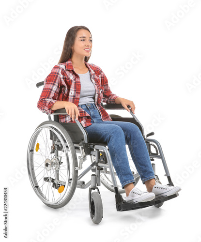 Young woman sitting in whee...