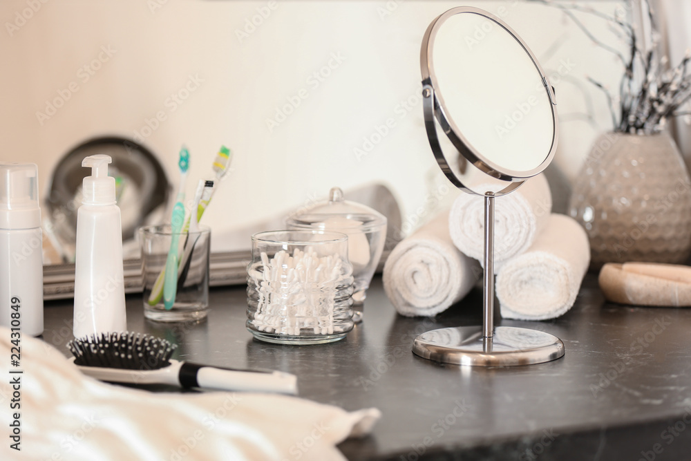 Body care accessories on table in bathroom Body care accessories on table in bathroom