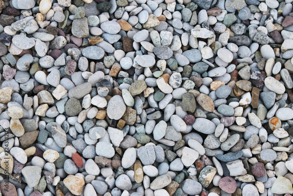 Fine pebbles of a gray shade. Beach ground. Natural material for design, decoration and construction. Sanded granite and hard minerals. Geology and minerals. Tutorial. Fine pebbles of a gray shade. Beach ground. Natural material for design, decoration and construction. Sanded granite and hard minerals. Geology and minerals. Tutorial.