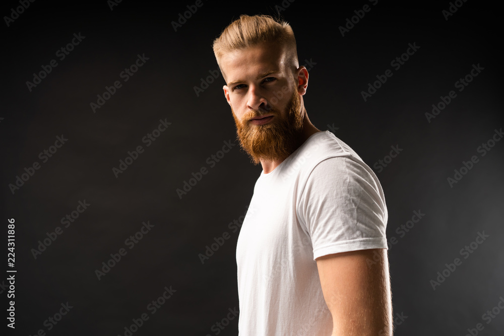 Handsome young guy posing in studio - isolated. Handsome young guy posing in studio - isolated.