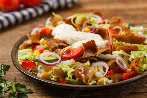 Gyros, kebeb. Salad with mutton and vegetables.