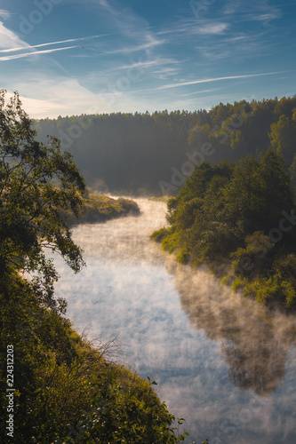Landscape. Dawn on the river. Sunrise  morning  fog. The Bystrica River  Kirov Region  Russia.View of the river from a height.